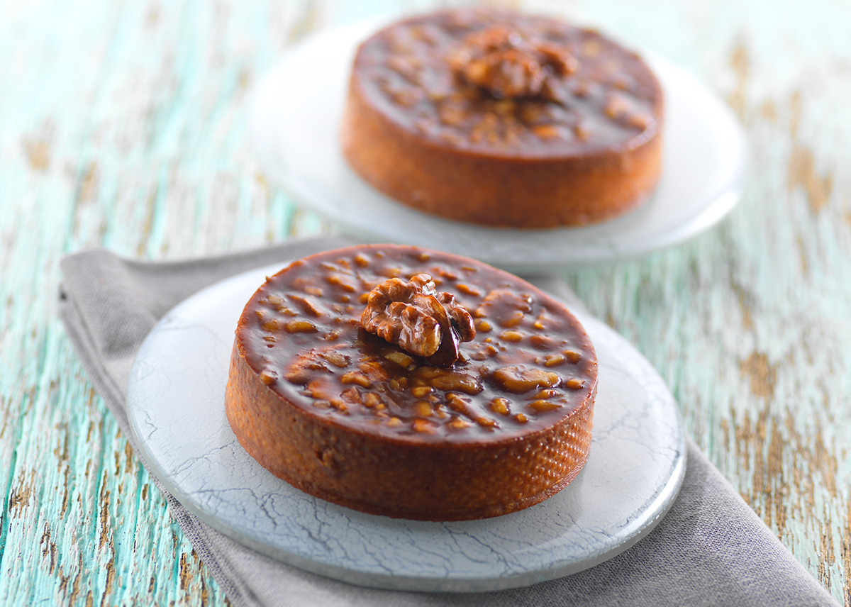 Photo de tartelettes gourmandes aux noix et caramel.